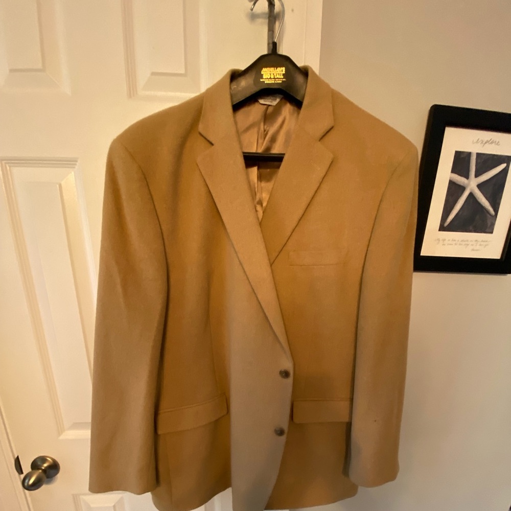 Joseph & Feiss 100% Camelhair sport coat.  Tan in color. Size 54 Long.